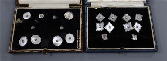 A cased eight piece mother of pearl and seed pearl set rolled gold dress stud set and one other part set.